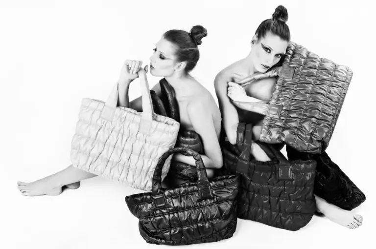 models holding bags